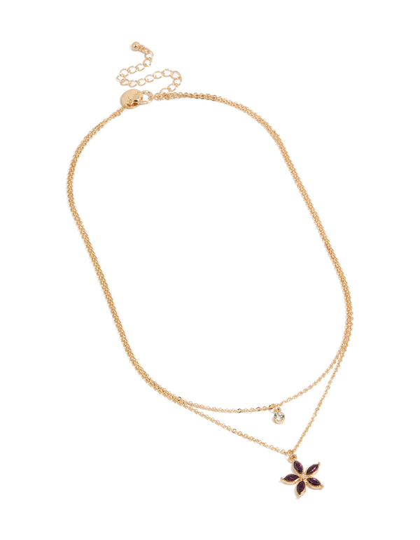 Crafted from gold with clear and purple diamante floral pendant layered necklace front view