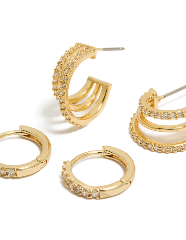 Crafted from gold plated cubic zirconia, these huggies and illusion hoop earrings in a 2-pack close up view