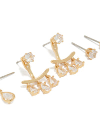 Highlighting dainty stud earrings in a 3-pack with pear cut cubic zirconia and gold plated ear jacket closures close up view - link has visual effect only