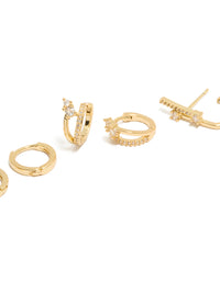 Highlighting gold plated studs and double cuff huggie earrings with cubic zirconia crystals in a 3-pack close up view - link has visual effect only