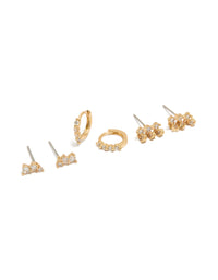 Showcasing dainty gold plated cubic zirconia trio studs and huggie earrings in a 3-pack front view - link has visual effect only