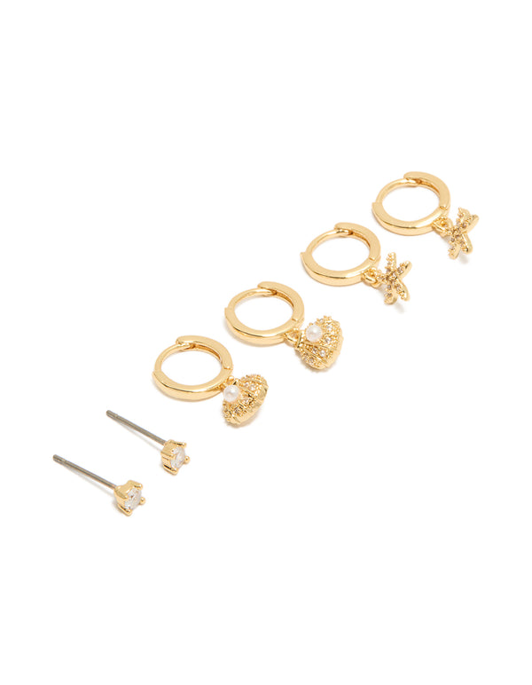 Showcasing gold plated cubic zirconia studs and mini starfish huggie earrings 3-pack featuring shell, ocean pearl crystal front view