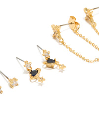 Showcasing statement celestial chain & stud earrings with gold plated cubic zirconia star motifs in a 3-pack close up view - link has visual effect only
