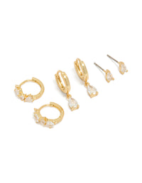 Showcasing gold plated pear cubic zirconia huggie and stud earrings in a 3-pack with crystal accents front view - link has visual effect only