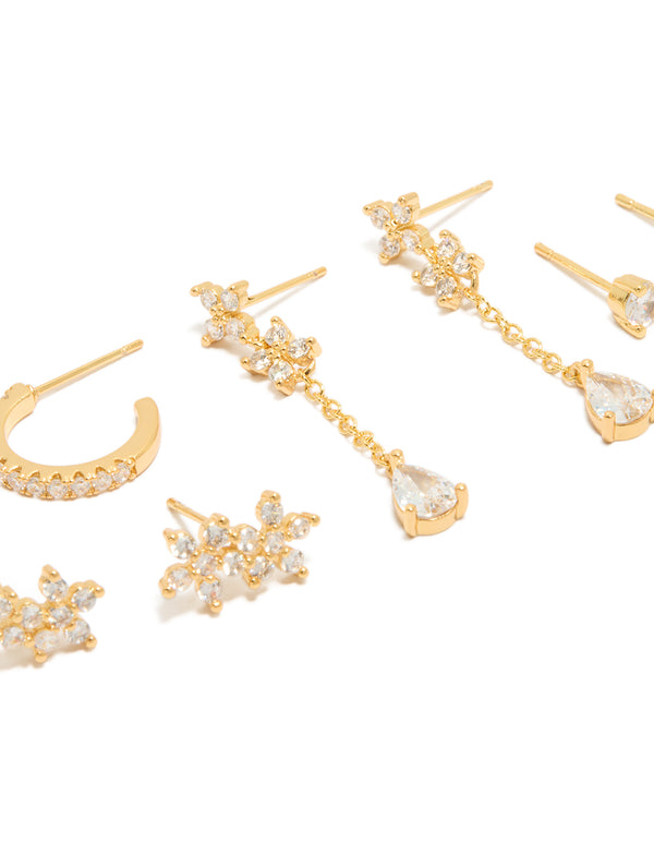 Featuring gold plated cubic zirconia flower studs and chain drop earrings 4-pack and stud closure close up view