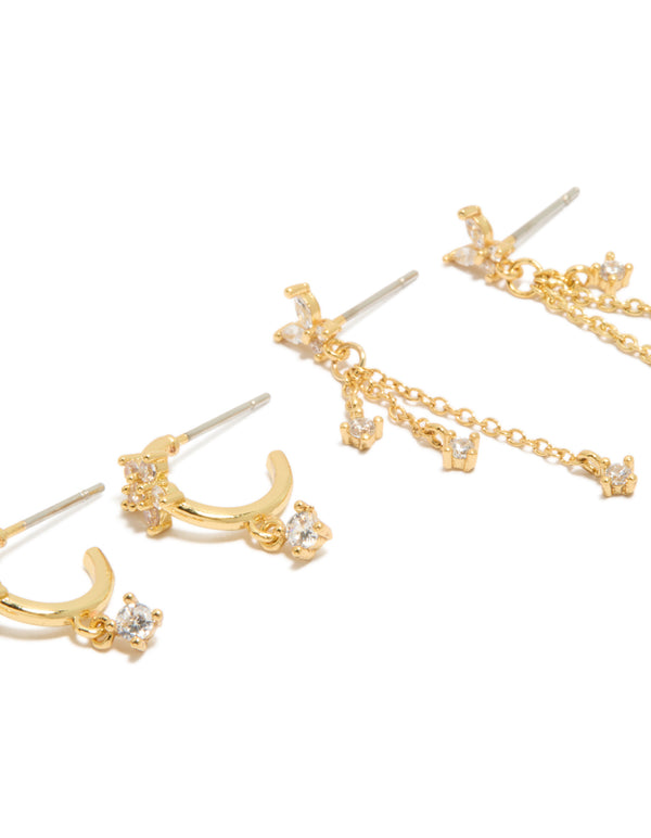Featuring gold plated butterfly charm chain and stud earrings 3-pack with cubic zirconia and huggie closure close up view
