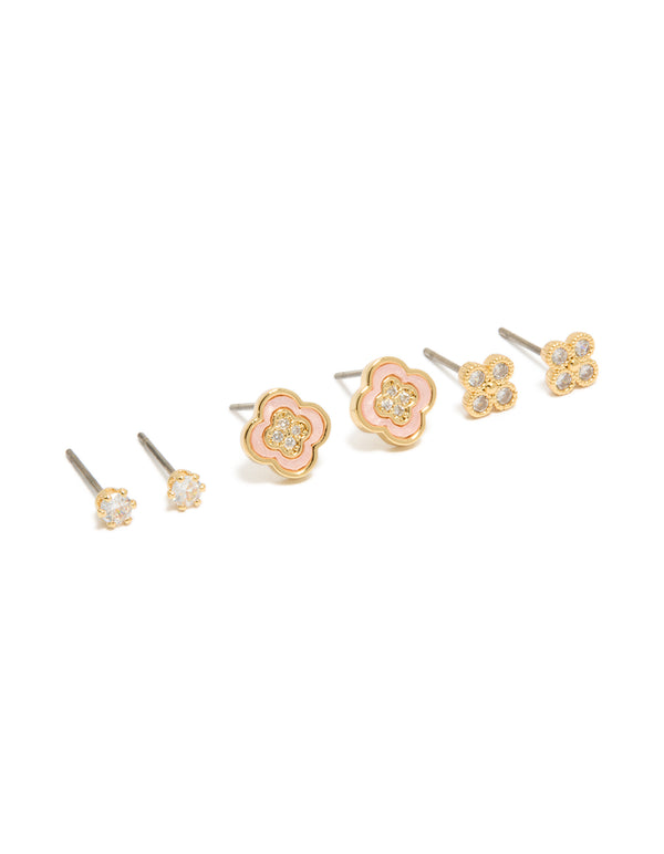 Showcasing gold plated cubic zirconia flower stud earrings in a 3-pack and crystal accents front view