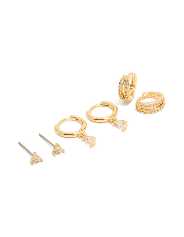 Presenting a dainty huggie earrings 3-pack with cubic zirconia and crystal featuring gold plated material in gold color front view