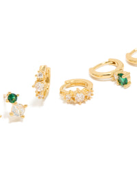 Featuring gold plated green and clear cubic zirconia stud and huggie earrings in a 3-pack close up view - link has visual effect only