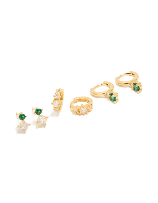 Showcasing a gold plated green and clear cubic zirconia stud and huggie earrings 3-pack front view