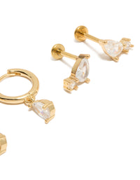Featuring gold plated cubic zirconia teardrop flat back studs and huggie earrings pack with titanium in clear close up view - link has visual effect only