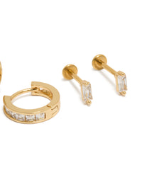 Featuring dainty flat back studs and hoops pack in gold plated titanium with baguette cut cubic zirconia crystal close up view - link has visual effect only