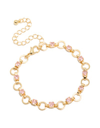 Crafted from gold plated material, this statement bracelet features alternating pink cubic zirconia with round stone cut in light link design front view - link has visual effect only