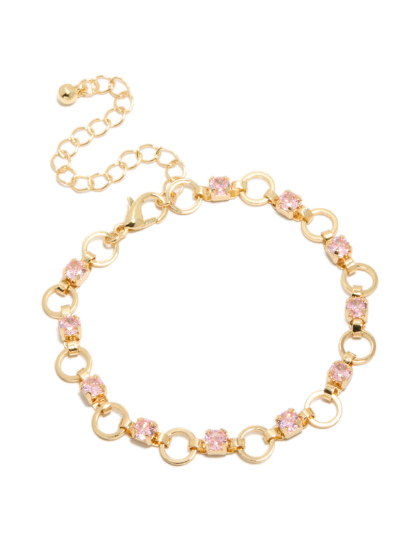 Crafted from gold plated material, this statement bracelet features alternating pink cubic zirconia with round stone cut in light link design front view