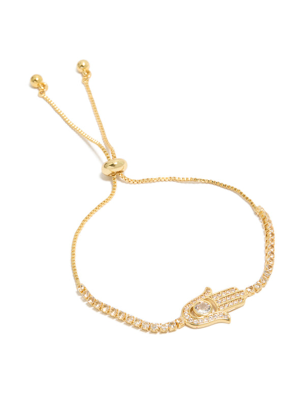 Crafted from gold plated material, this bracelet features a hamsa hand with cubic zirconia stones in a statement style front view