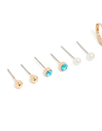 Crafted from gold, these sea life stud earrings showcase turquoise beads, pearl accents, and shell charms in a 6-pack close up view - link has visual effect only