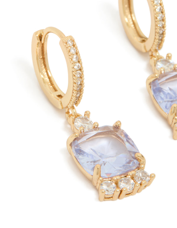 Crafted from gold featuring purple cubic zirconia square huggie earrings with lavender stones and white accents close up view