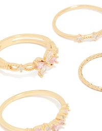 Featuring gold pink and clear cubic zirconia flower rings 5-pack with butterfly charm and floral crystal details close up view - link has visual effect only