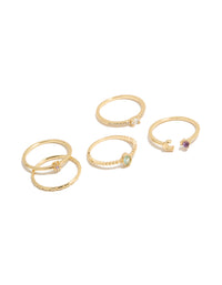 Showcasing a gold celestial cubic zirconia rings 5-pack featuring sun, moon and oval stone cut in a dainty style front view - link has visual effect only