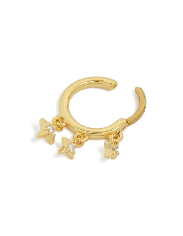 Presenting a gold plated surgical steel clicker ring with celestial star charms featuring cubic zirconia, dainty in gold detail view