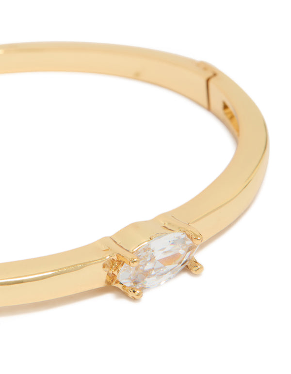 Featuring a gold plated cubic zirconia inlay hinged bangle close up view