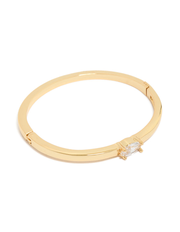 Showcasing a gold plated cubic zirconia inlay hinged bangle front view