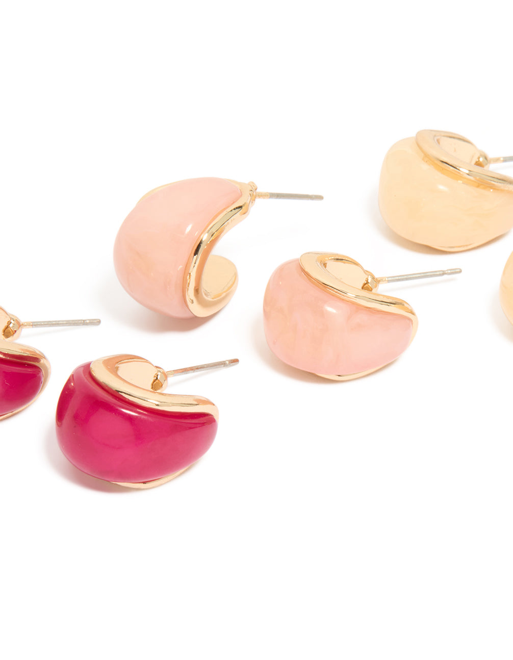 Featuring chunky hoop earrings in a 3-pack with red, pink, and beige acrylic bubble design featuring gold accents in close up view