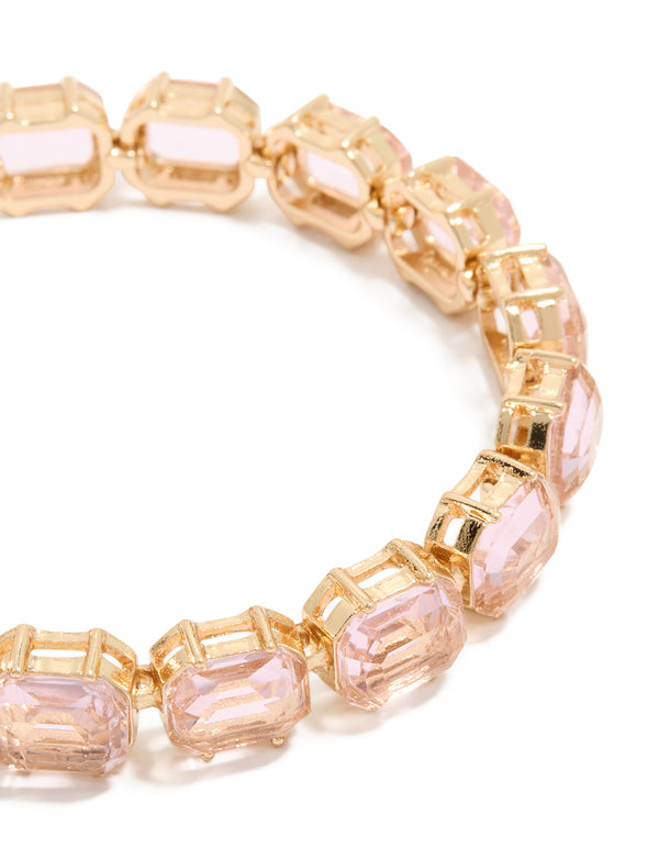Designed with gold and light pink diamantes bracelet close up view