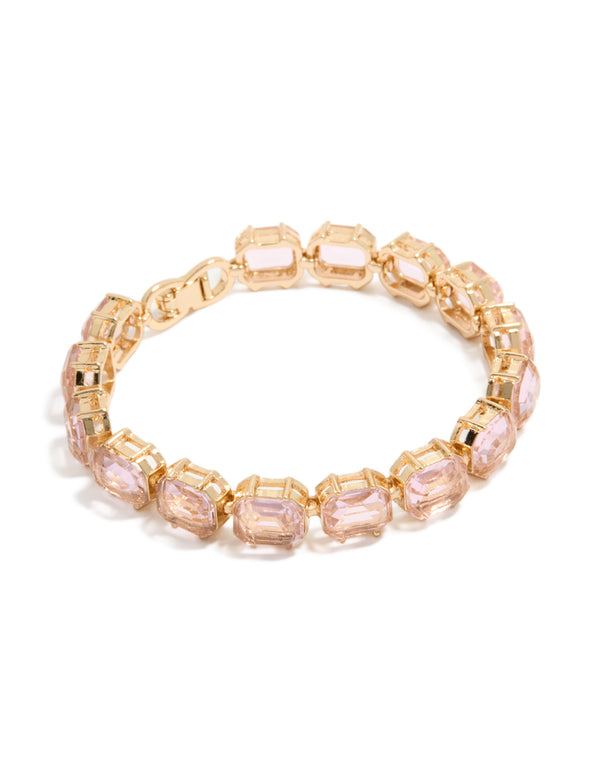 Showcasing a bracelet with light pink diamantes in gold front view