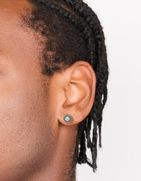 Shop waterproof stainless steel round cubic zirconia flat back studs shown in an on ear view - link has visual effect only