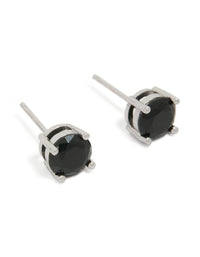 Showcasing mens round cut stud earrings crafted from waterproof stainless steel with black cubic zirconia in silver front view - link has visual effect only