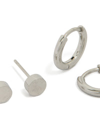 Crafted from waterproof stainless steel, men's flat stud and huggie earrings in a 2-pack with silver finish close up view - link has visual effect only