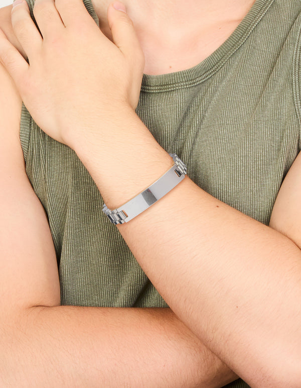Featuring a mens waterproof stainless steel large link chain bracelet with bar detail in silver on wrist view