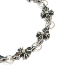 Designed with waterproof stainless steel cross links in silver and black close up view - link has visual effect only