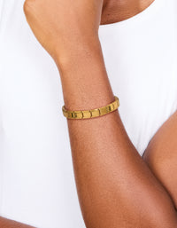 Featuring waterproof gold plated stainless steel stretch link chain bracelet in gold on wrist view - link has visual effect only