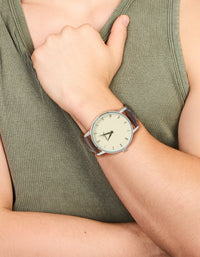 Showcasing snake skin design on a white roman dial, round shape for men, formal occasion styling, brown leather strap, and analog PU leather watch on wrist view - link has visual effect only