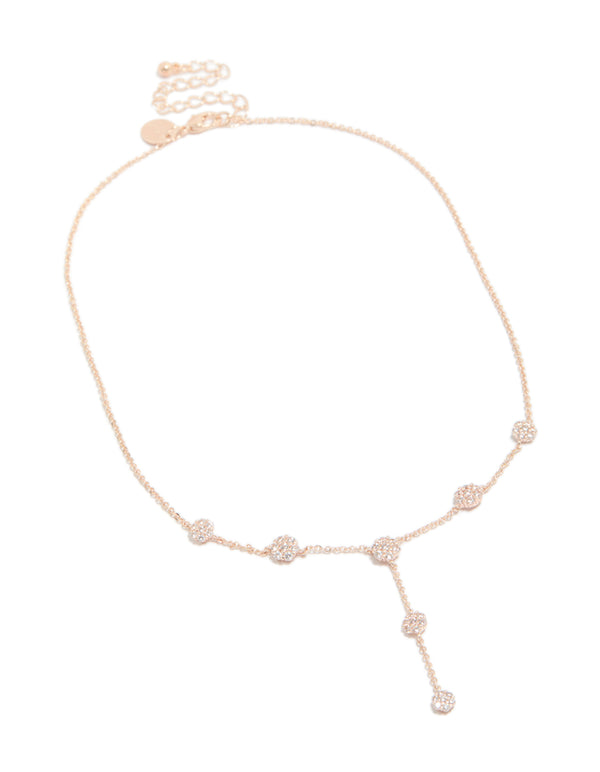 Elegant rose gold cubic zirconia mini floral y-necklace with charm featuring dainty pattern front view