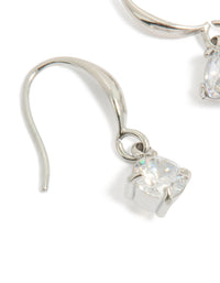 Designed with waterproof stainless steel sleek drop earrings featuring round cubic zirconia in silver close up view - link has visual effect only
