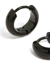 A detailed look at waterproof black coated stainless steel chunky huggie earrings close up view - link has visual effect only