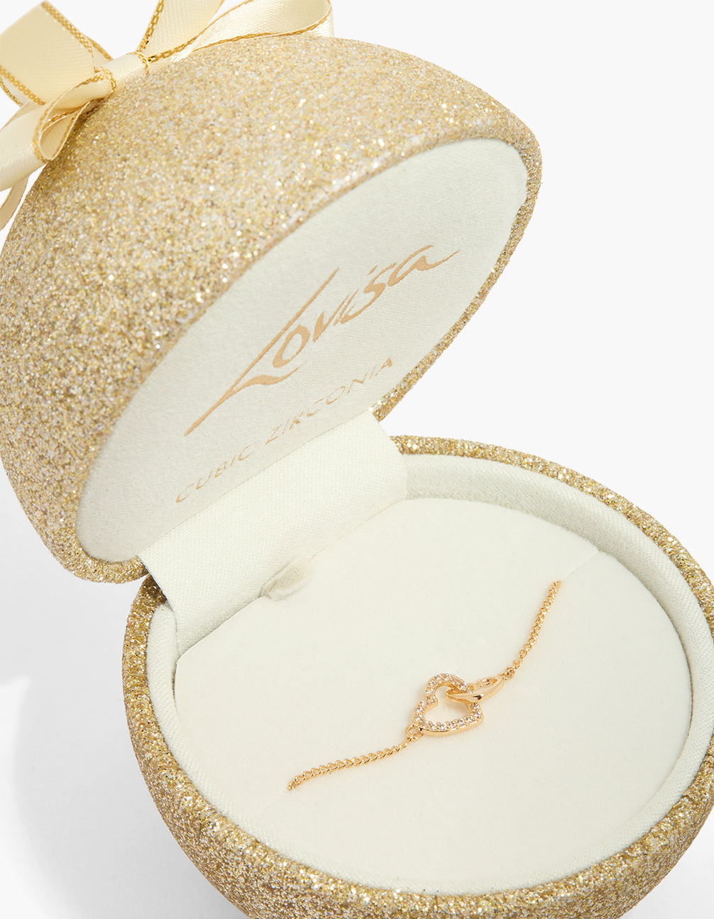Elegantly presented gold cubic zirconia heart link chain bracelet with dainty styling on wrist view