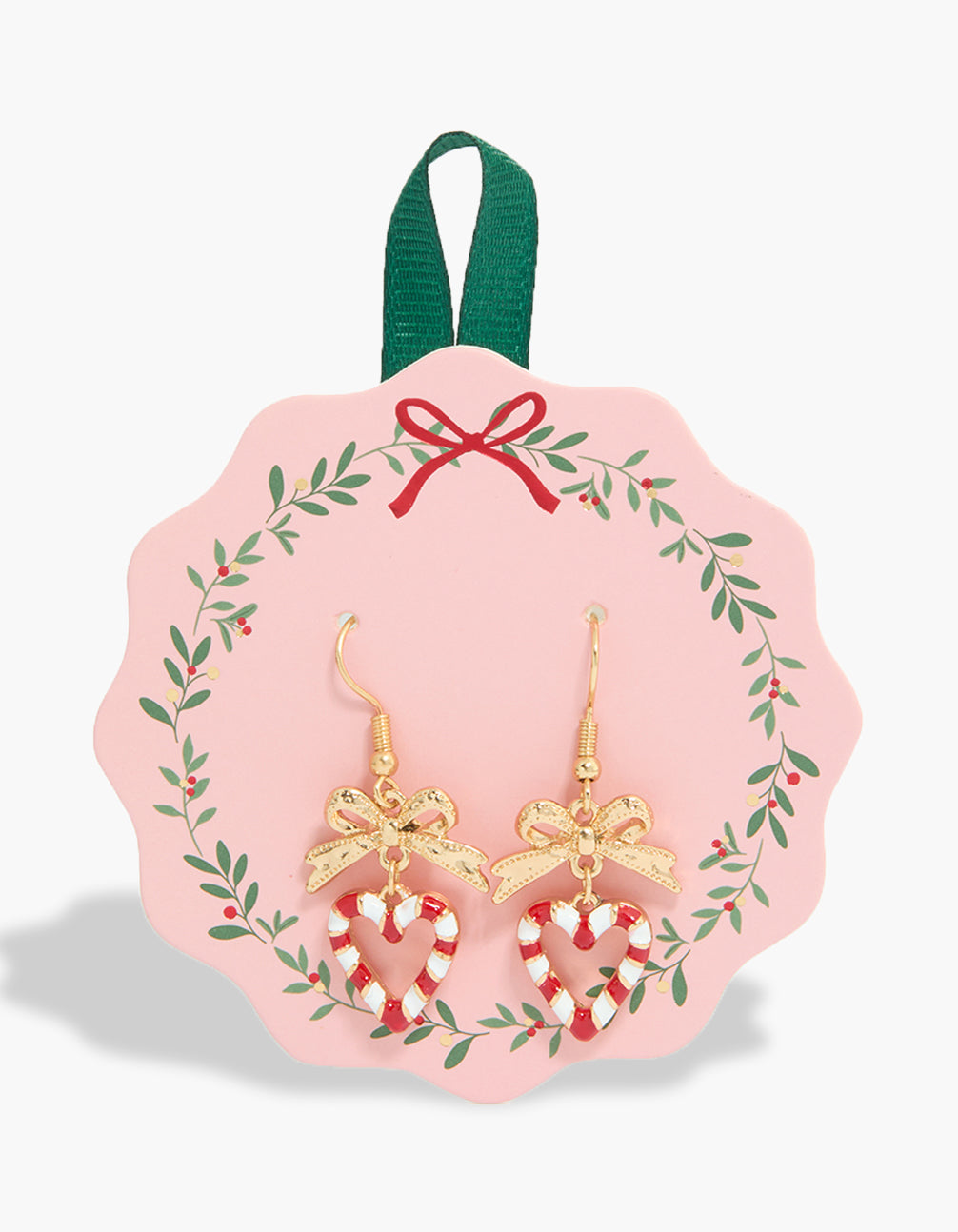Showcasing candy cane heart statement earrings with bow and food details in gold front view