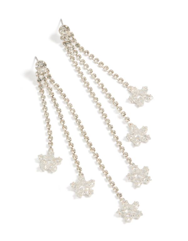 Beautifully crafted silver diamante triple tassel drop earrings featuring floral details in dainty style front view
