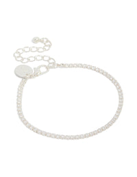 Elegant tennis bracelet crafted from silver plated metal with cubic zirconia round stones front view - link has visual effect only