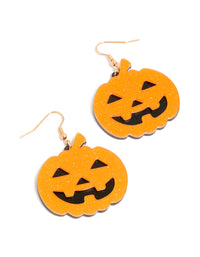 Showcasing statement drop earrings with glitter charm pumpkins in orange, black, and gold front view - link has visual effect only