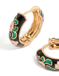 Designed with thick huggie earrings featuring floral pattern, enamel material, statement style in gold, black, and pink close up view - link has visual effect only