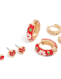 Crafted from gold red enamel huggie and stud earrings in a 3-pack with floral heart leaf patterns featuring cubic zirconia white green details close up view - link has visual effect only