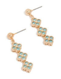 Showcasing drop earrings in gold with floral design featuring cubic zirconia and turquoise accents front view - link has visual effect only