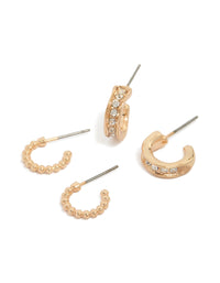 Showcasing gold bubble and diamante huggie earrings in a 2-pack with huggie closure front view - link has visual effect only