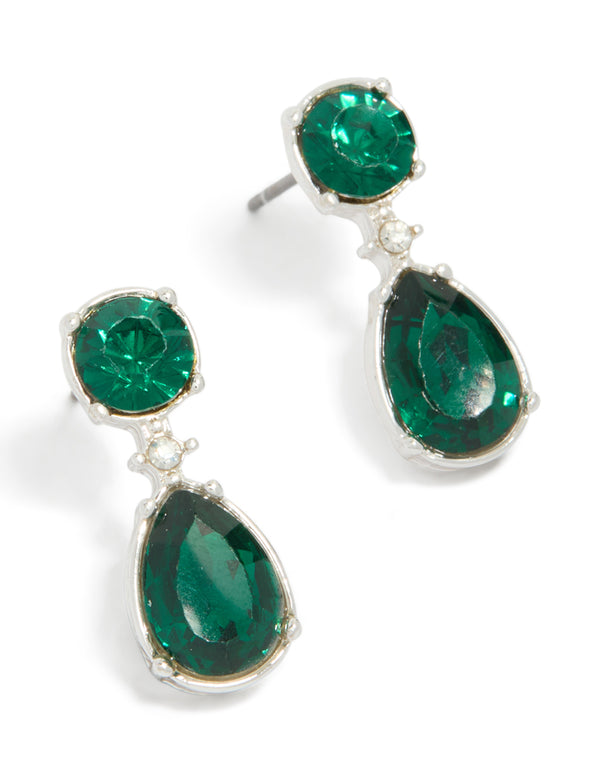 Showcasing statement earrings featuring teardrop and circle diamante stones in teal with silver finish front view