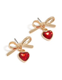 Showcasing gold bow and red diamante heart drop earrings front view - link has visual effect only